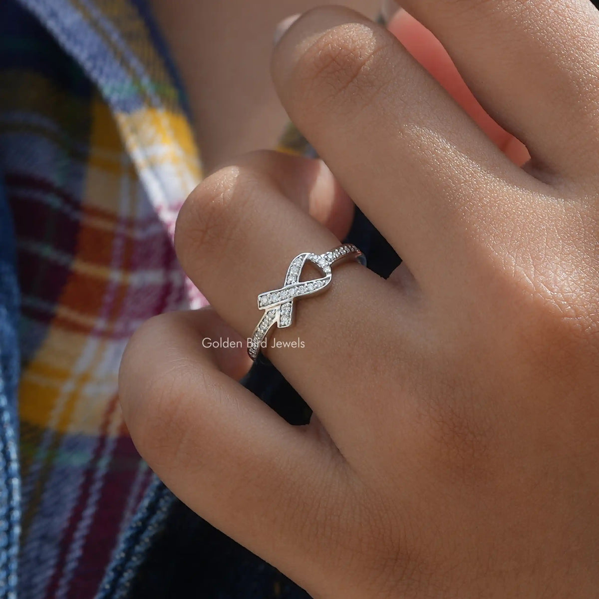 View of Ribbon Style Round Cut Moissanite Ring In Finger