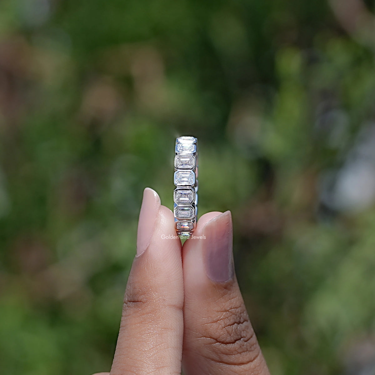 Side View of Bezel Set Emerald Cut Full Eternity Band