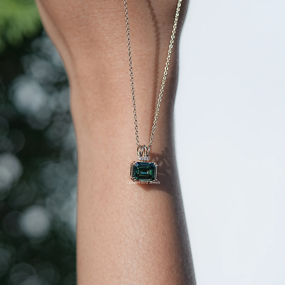 In hand Showing View Of Moissanite Solitaire pendant