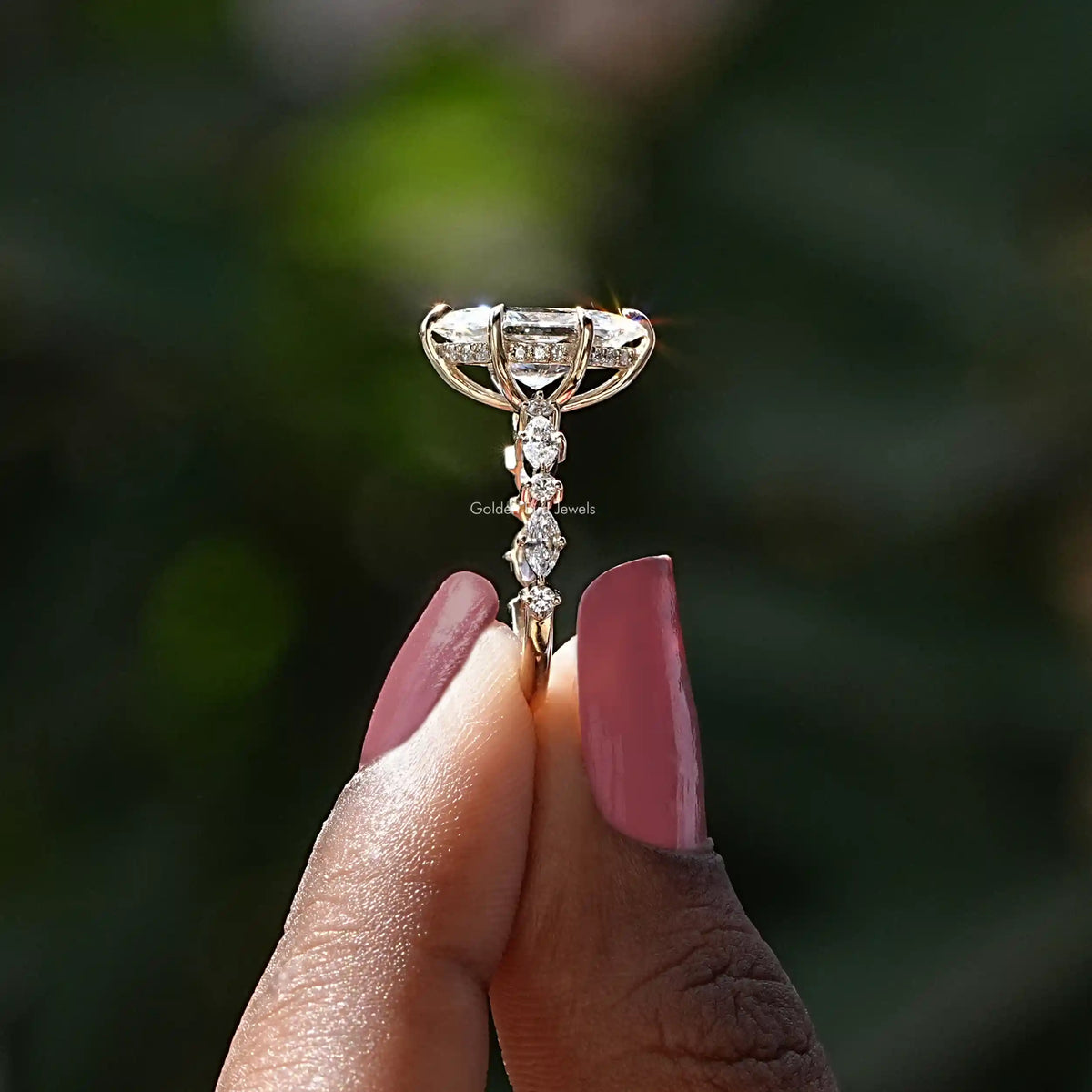 Side View of Dutch Marquise Cut Lab Diamond Ring In two fingers
