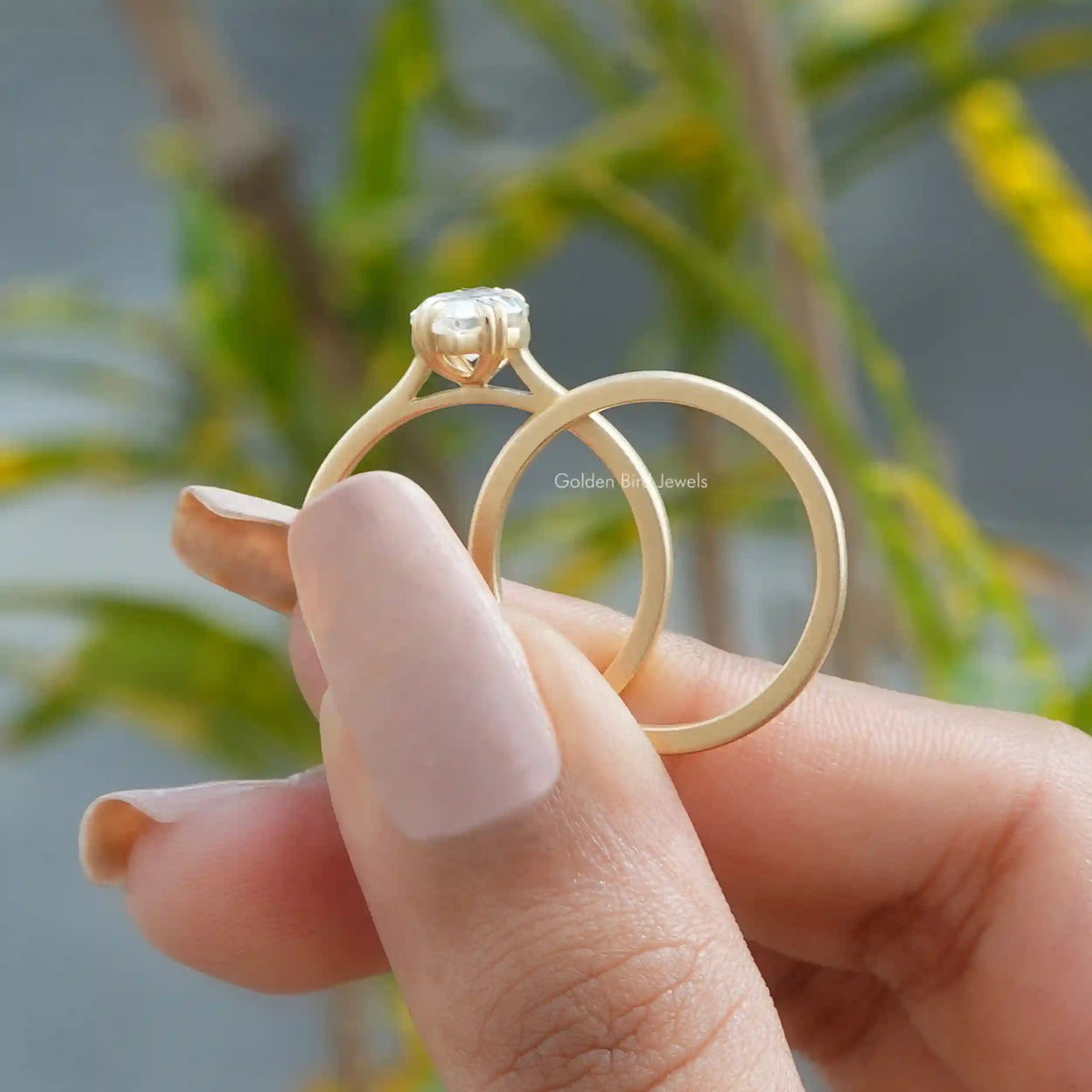 Side view of a solitaire Dutch marquise cut ring for women