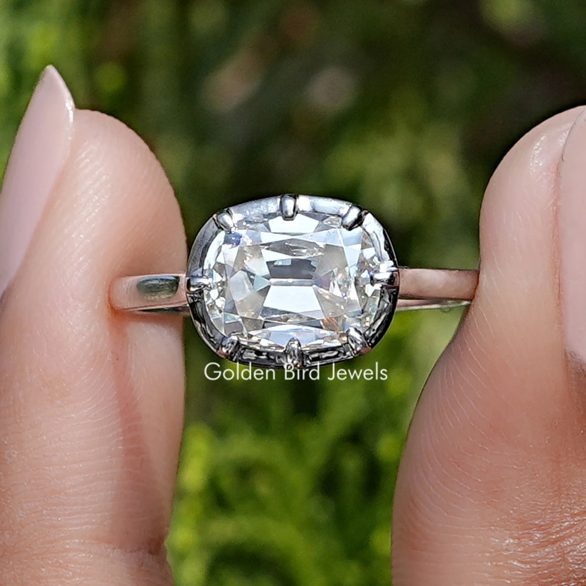 Front view of East West Cushion Cut Moissanite Solitaire Ring