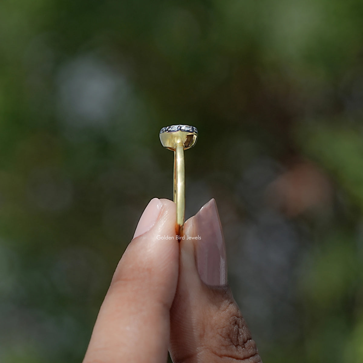 Side View of East West Oval Cut Moissanite Solitaire Ring