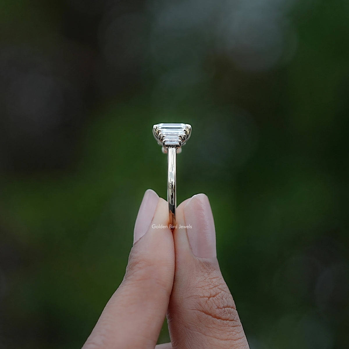 Side View of Emerald And Baguette Diamond Five Stone Ring