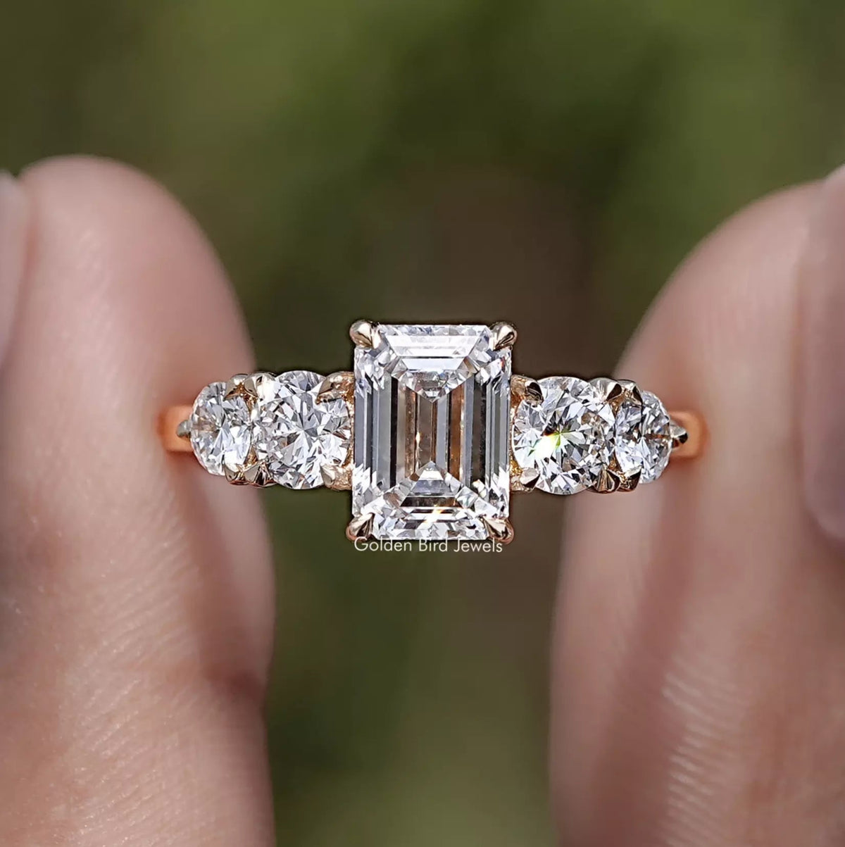 Emerald Cut Lab Diamond Five Stone Ring in Two Fingers