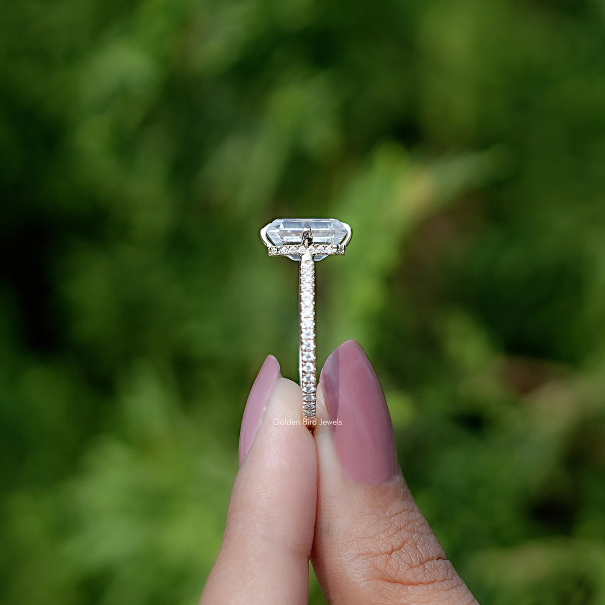 Side View of Emerald Cut Moissanite Hidden Halo Engagement Ring