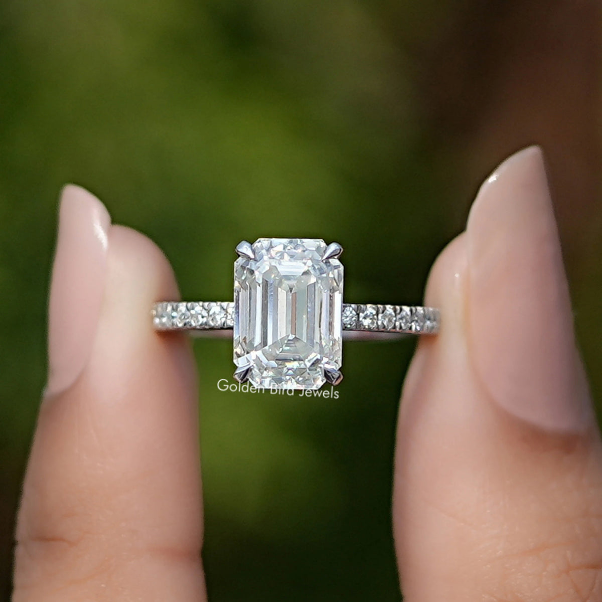 Front view of Emerald Cut Moissanite Bezel Set Engagement Ring