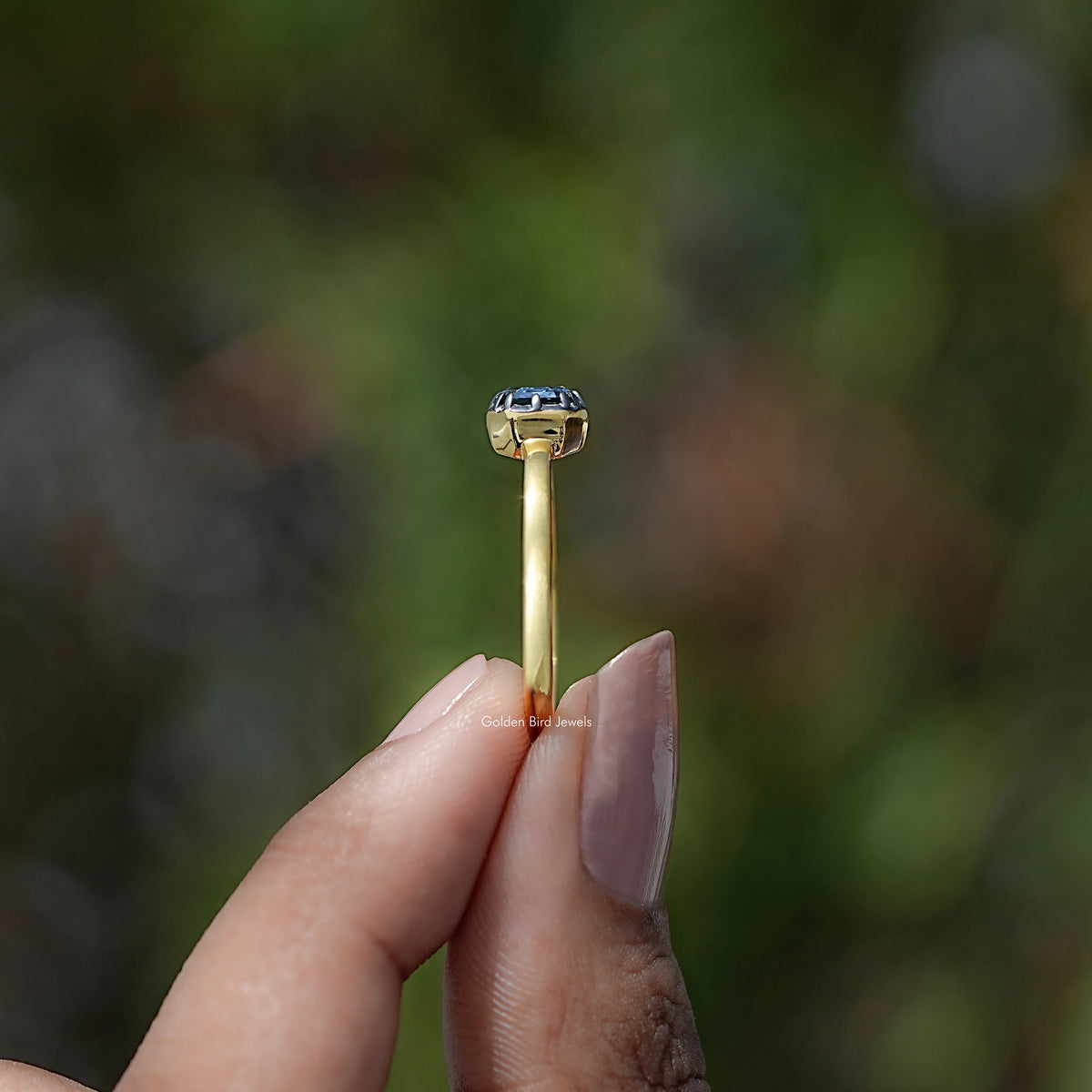 Side View of East West Emerald Cut Moissanite Solitaire Ring