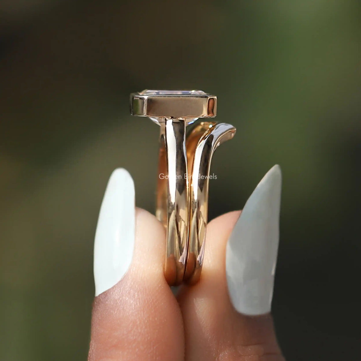 Side View of Emerald Cut Moissanite Solitaire Ring In finger