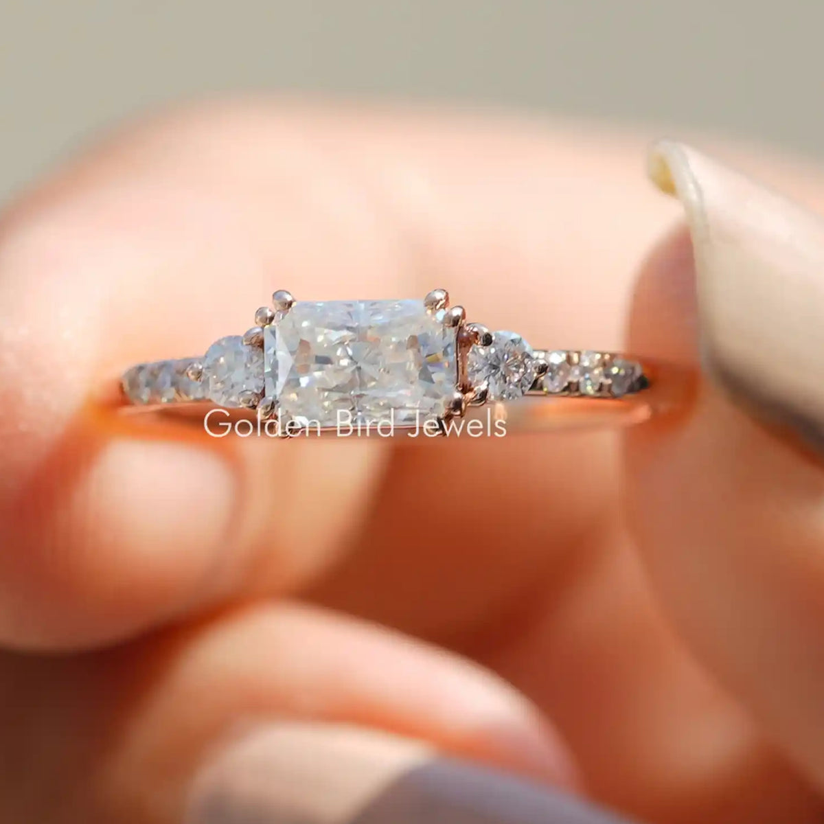 East West Colorless Radiant Cut Moissanite Ring