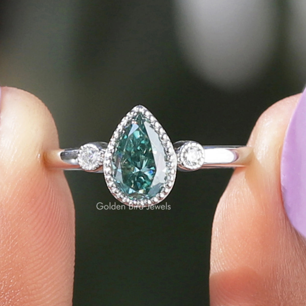 Blue Pear And Round Cut Three Stone Moissanite Ring