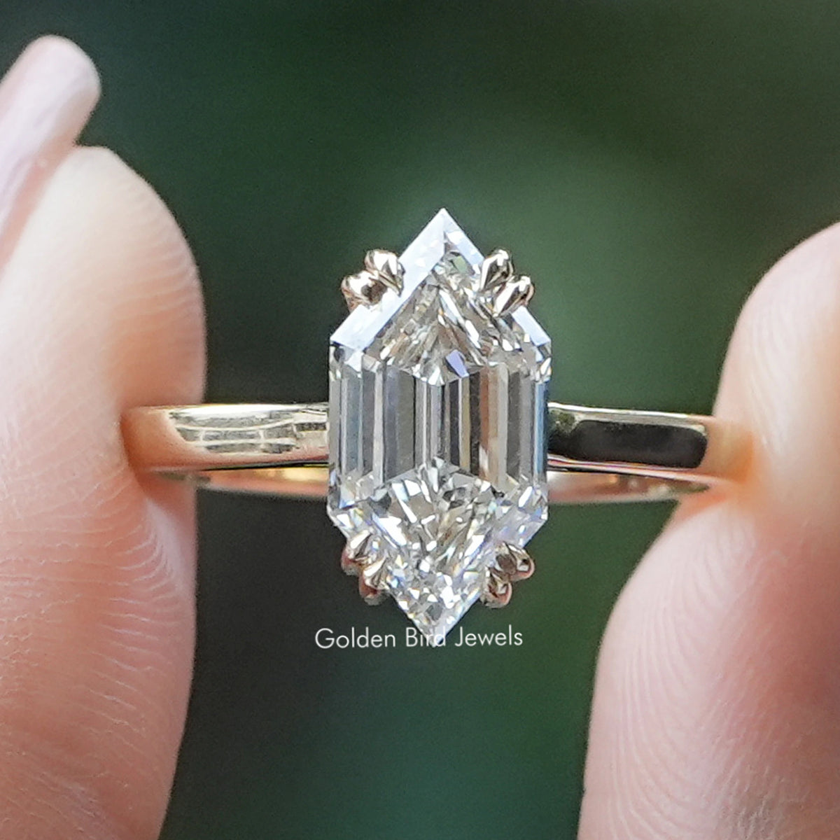 Step Cut Dutch Marquise Lab Diamond Ring held between fingers