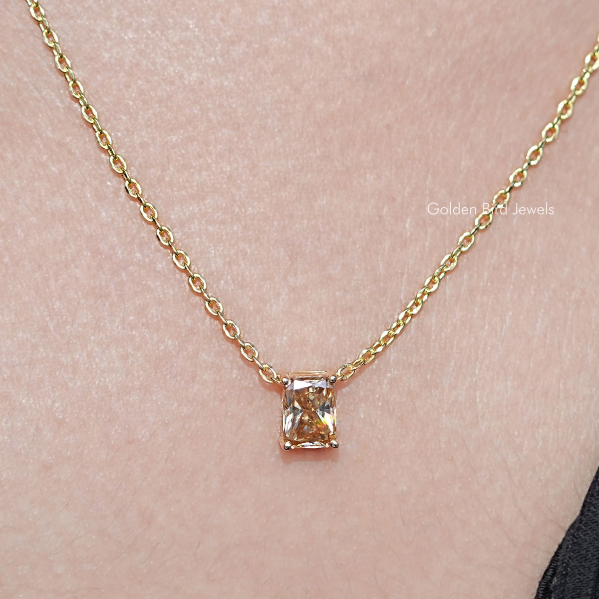 Front view of Champagne Emerald Cut Moissanite Solitaire Pendant