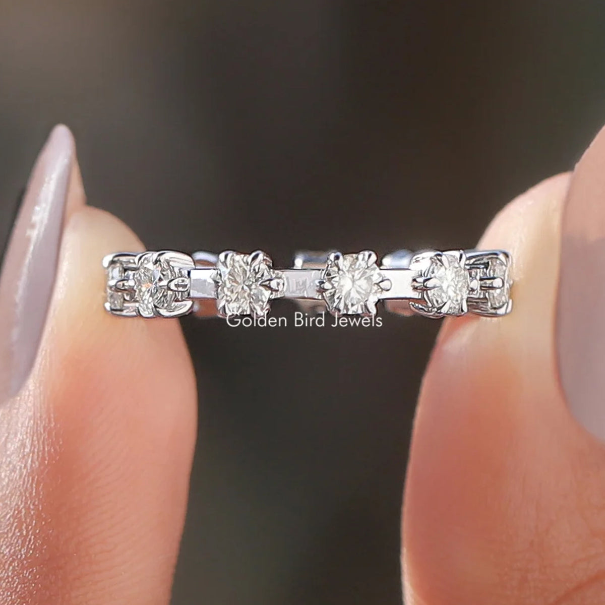 Round Moissanite Distance Eternity Band