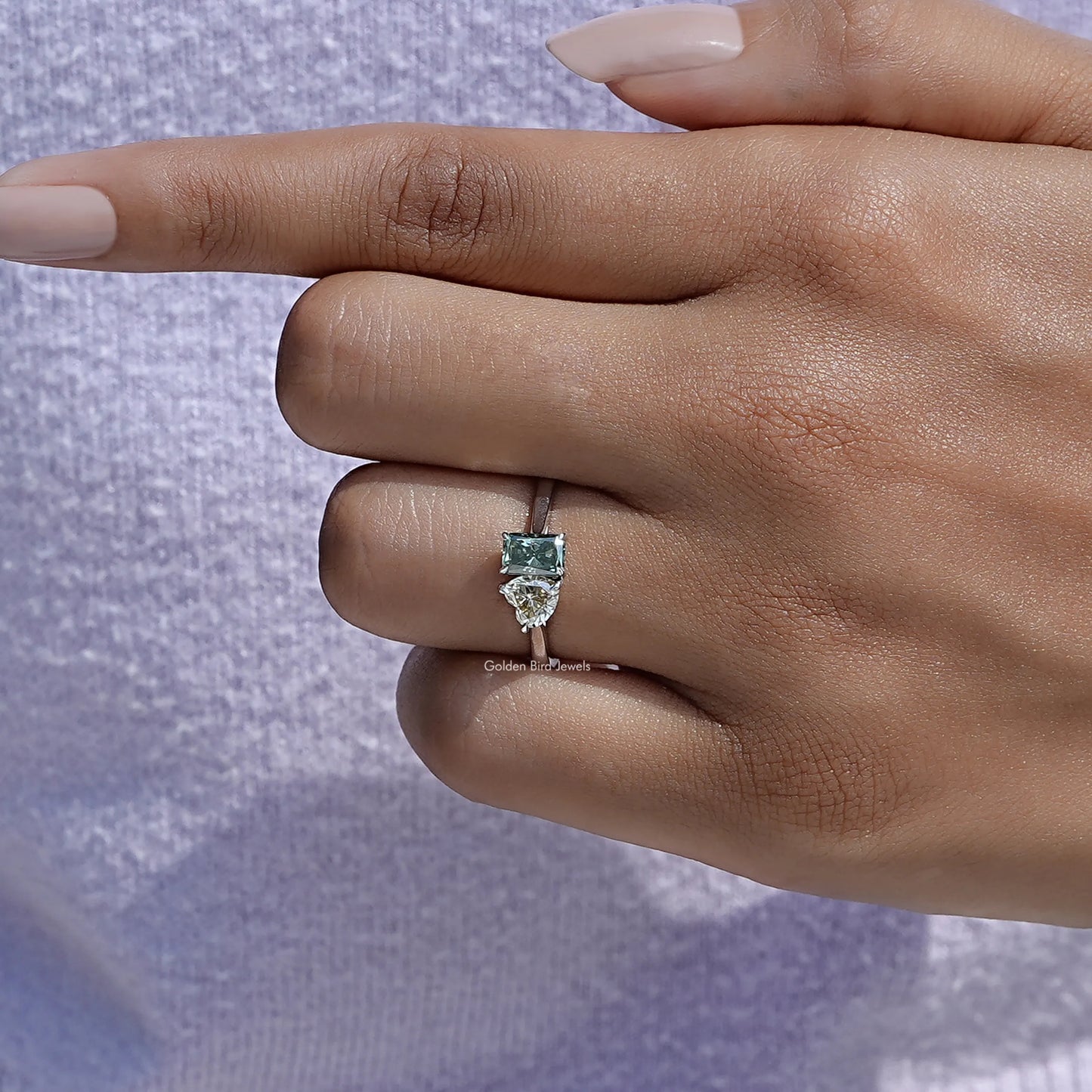 Close view of moissanite ring in secure setting