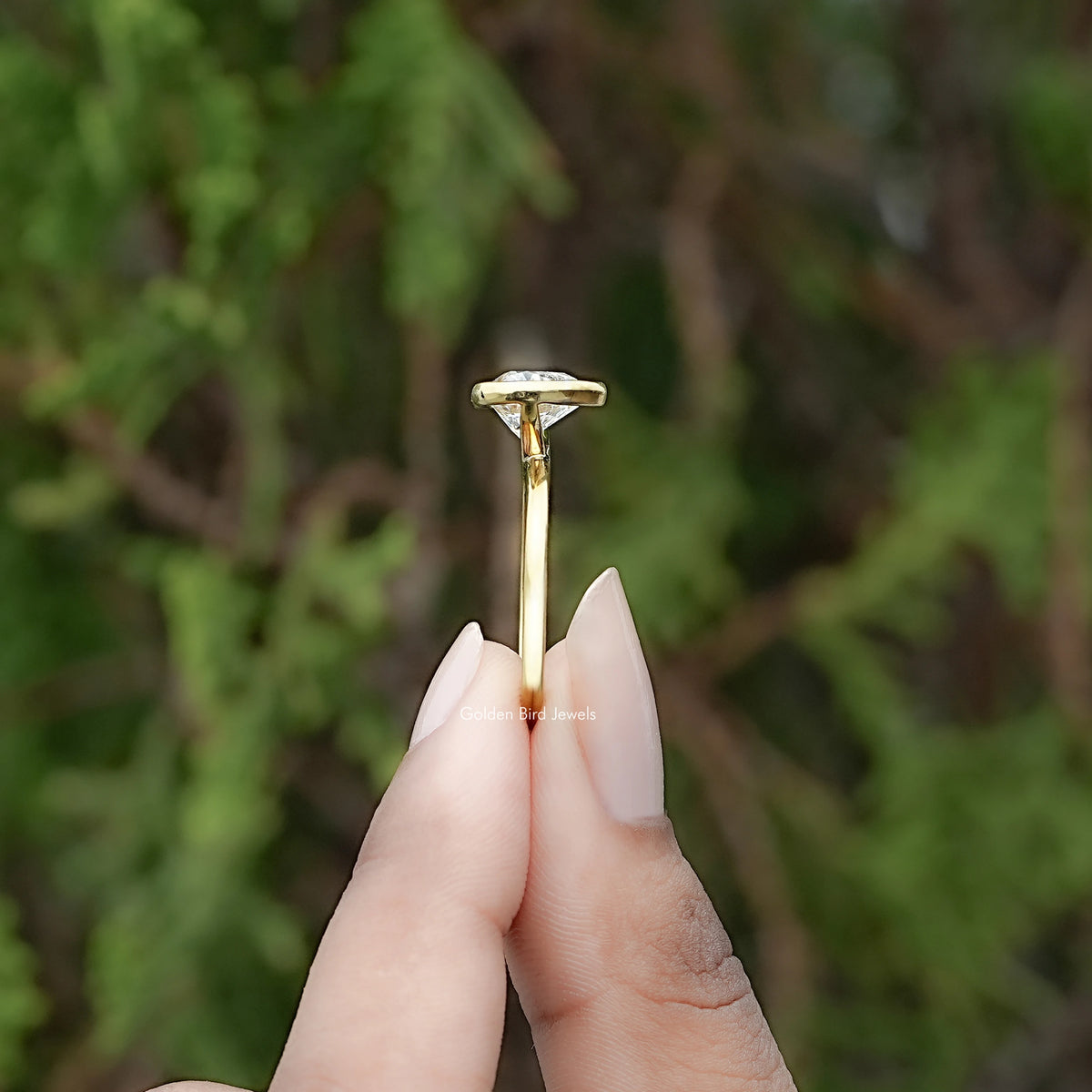 Side View of Heart Shaped Diamond Bezel Set Ring