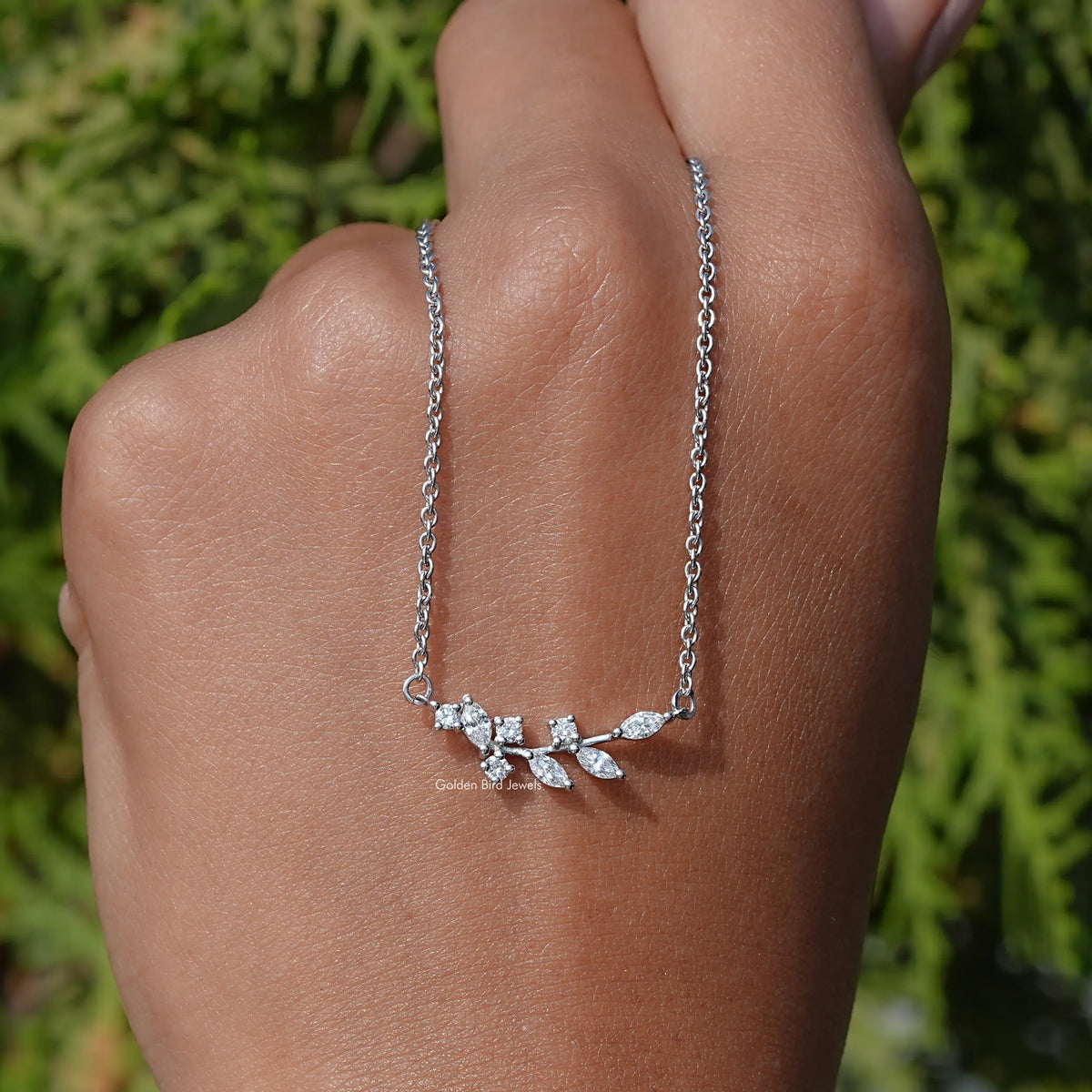 In Hand Holding In the Marquise Cut Lab Diamond Leaf Pendant