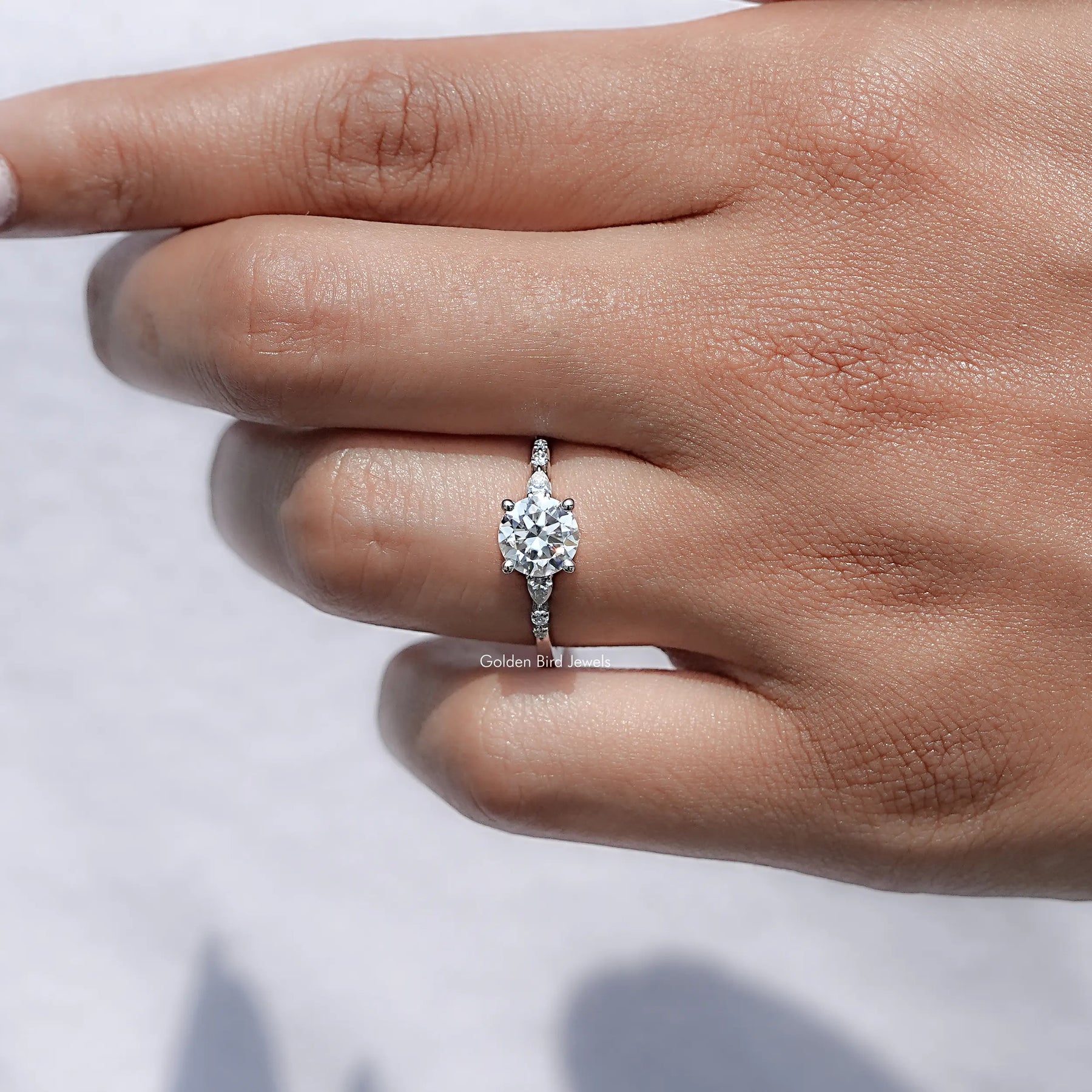 View of Round Cut Moissanite Solitaire Ring in prongs setting