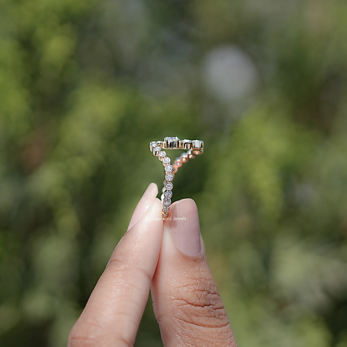 Side View of Round Cut Moissanite Curved Eternity Band