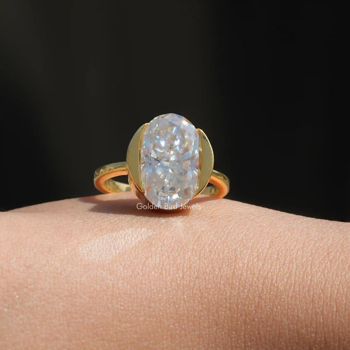 View of Oval Cut Moissanite Solitaire Ring In Yellow Gold