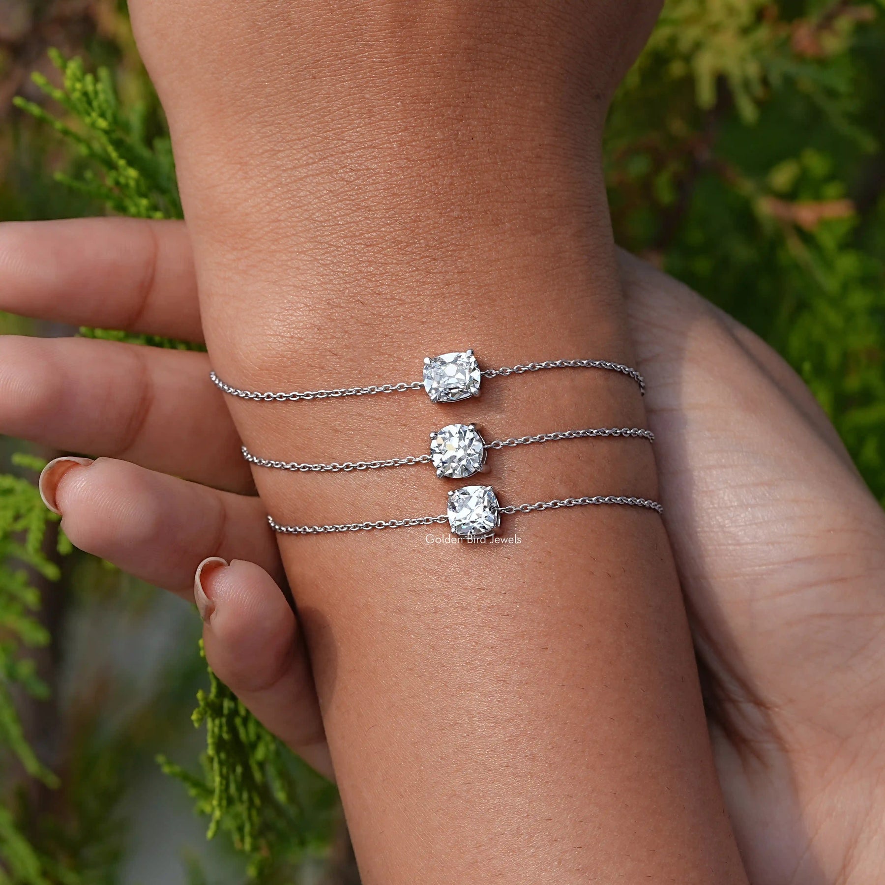 In hand view of multi diamond chain bracelet
