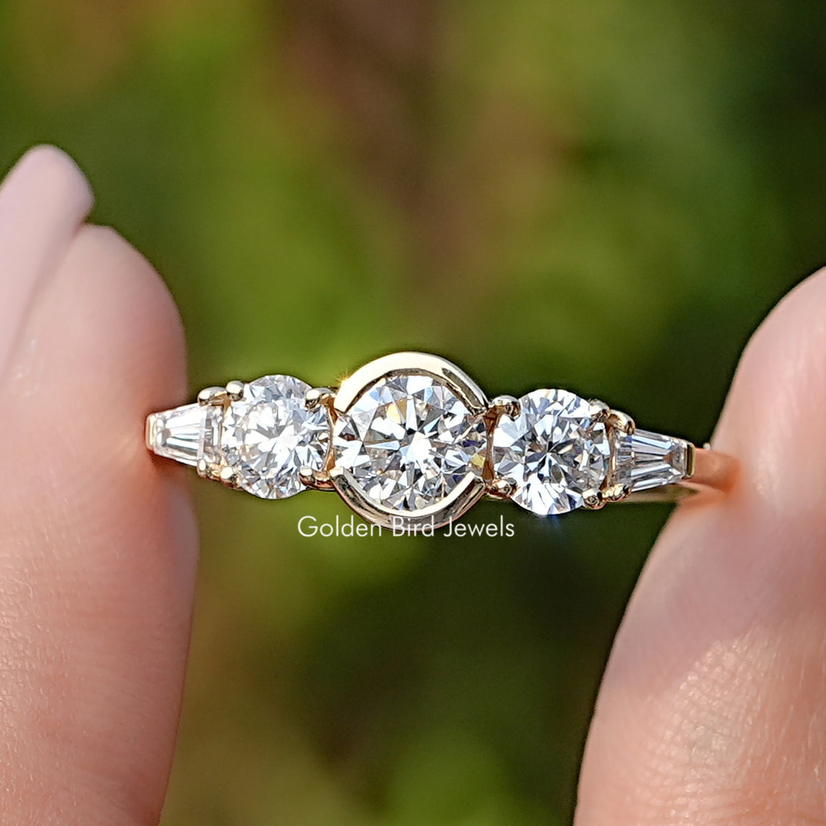 Round Lab Diamond Five Stone Ring Between Fingers