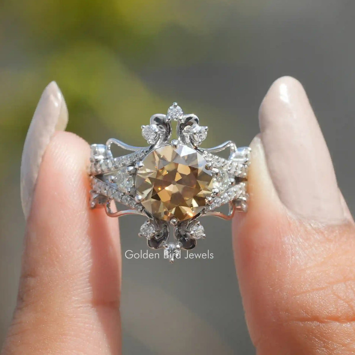 Front View of Old European Round Cut Moissanite Ring In two Fingers