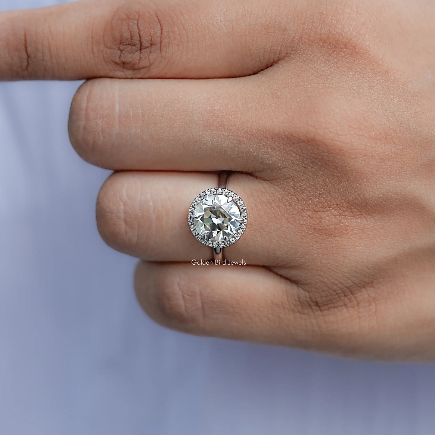 View of Round Cut Moissanite Engagement Ring in prongs setting