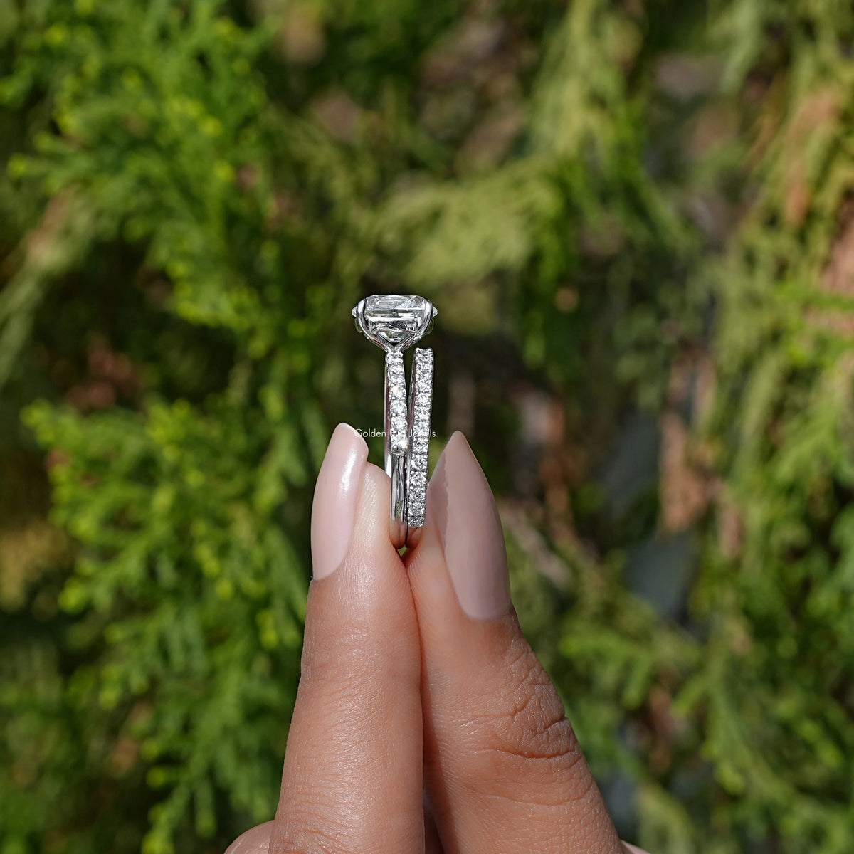 Side View of Lab Diamond Old Mine Cushion Cut Ring Set in two fingers