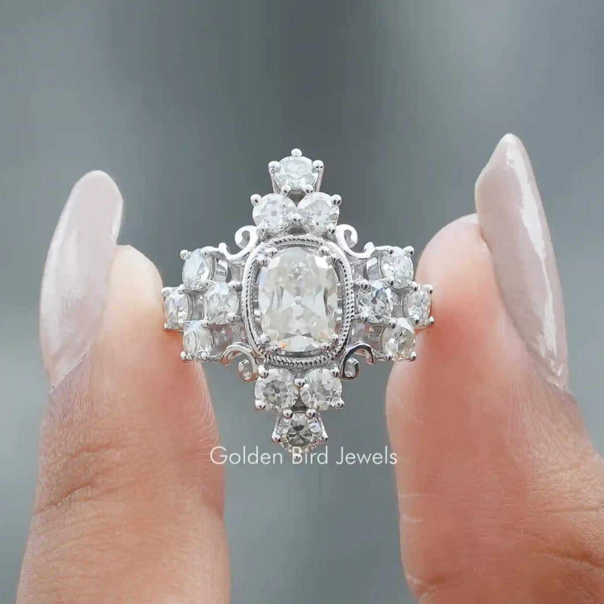 Front View of Old Mine Cushion Cut Vintage Style Engagement Ring In two Fingers