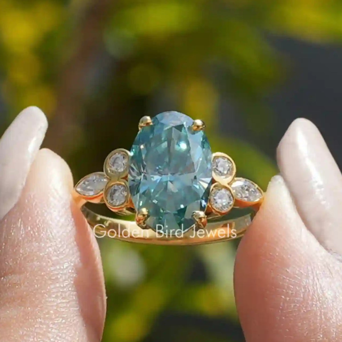 Front View of Oval Cut Moissanite Solitaire Ring In two Fingers