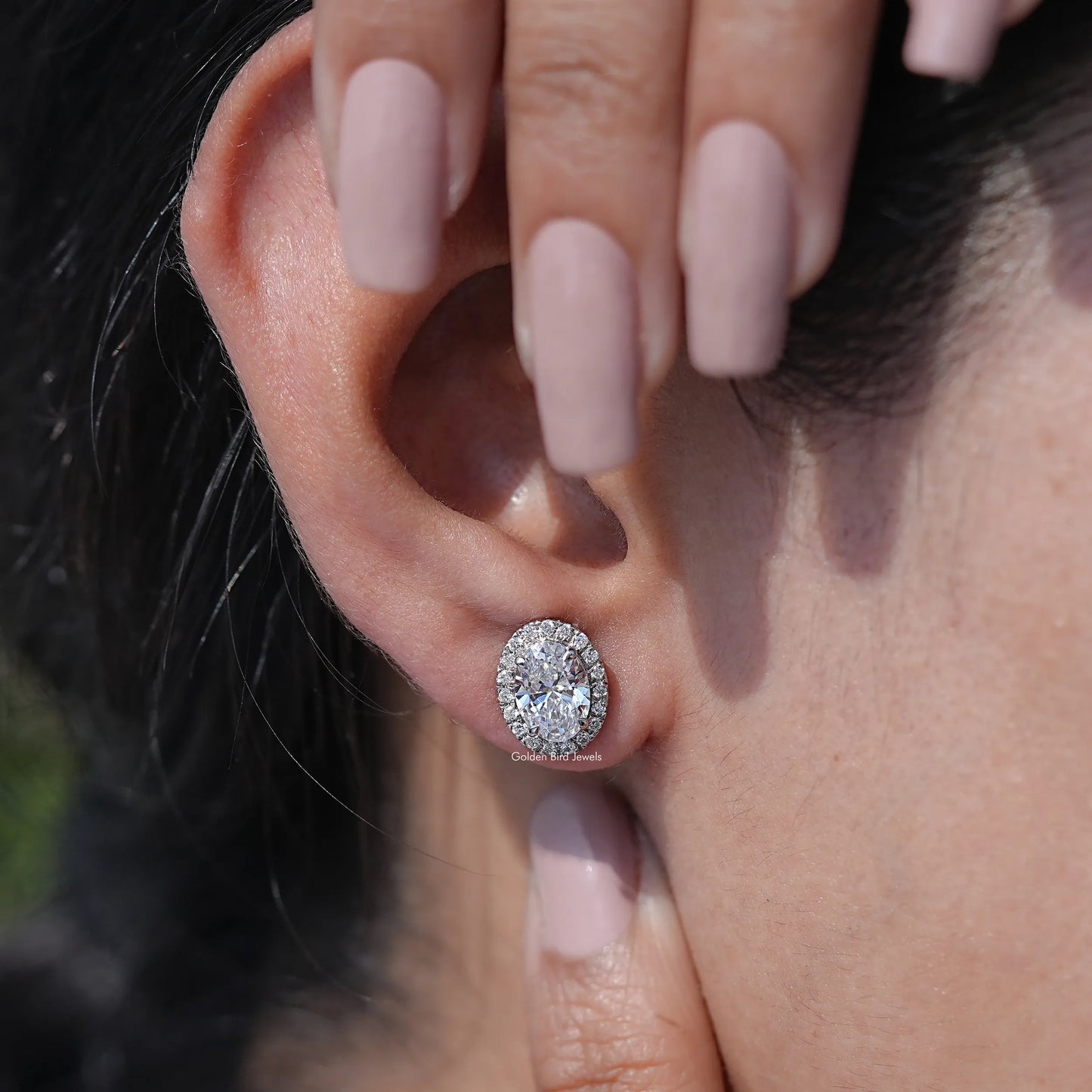 Close-Up View of Brilliant Cut Lab Diamond Halo Stud Earrings In White gold
