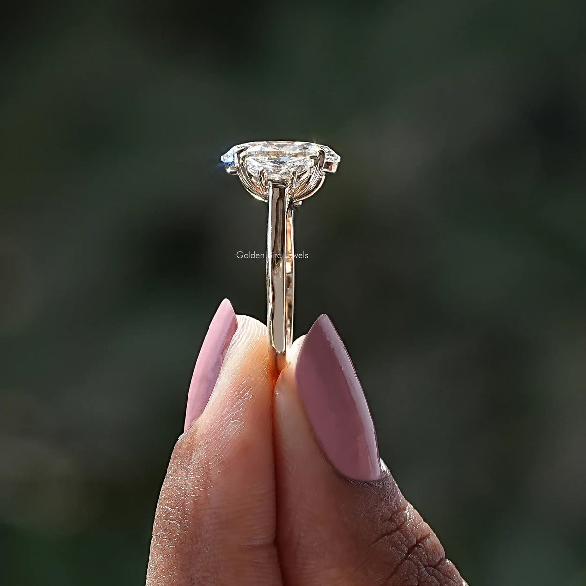 Side View of Oval Lab Diamond Three Stone Engagement Ring