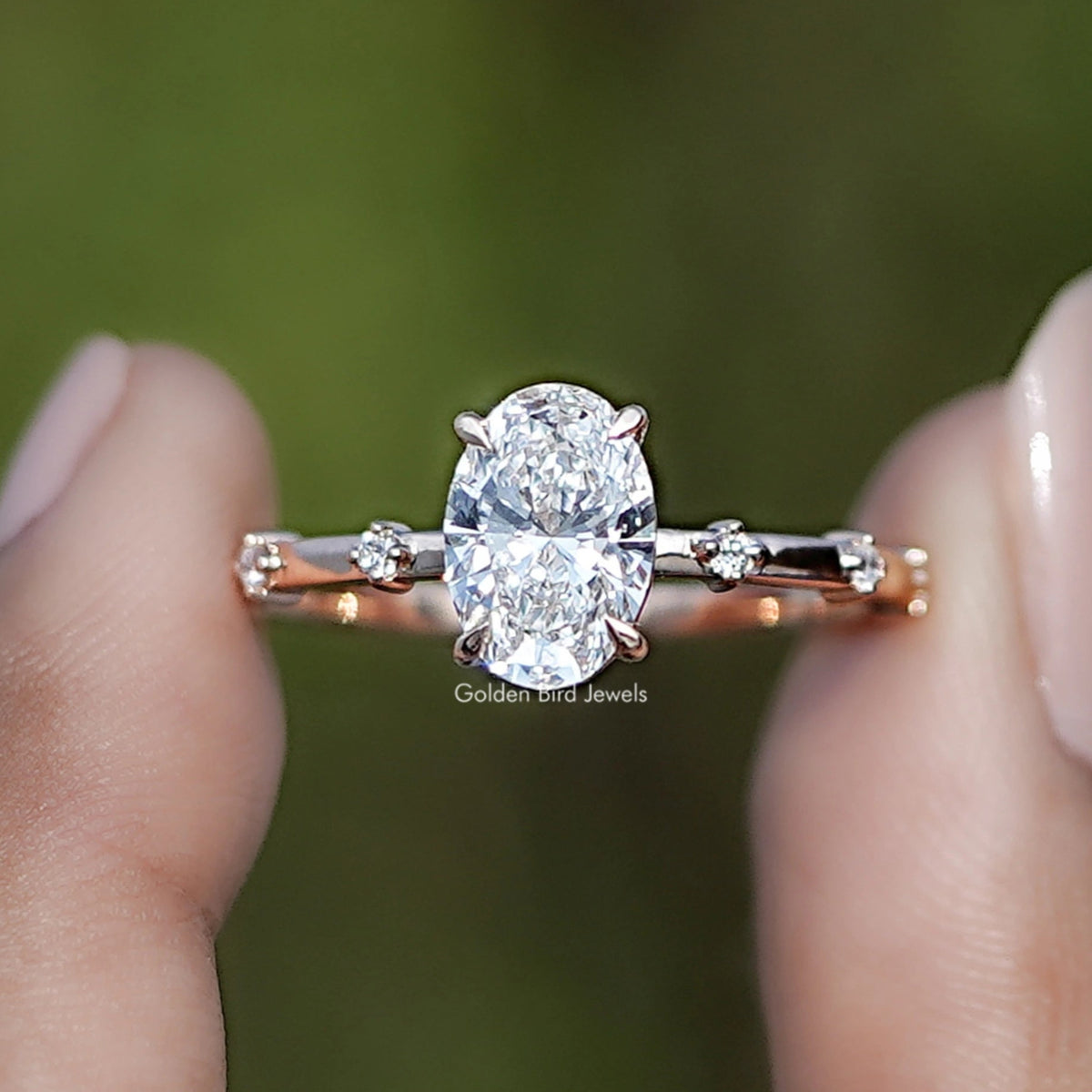 Oval Shaped Lab Diamond Distance Ring In Two Fingers