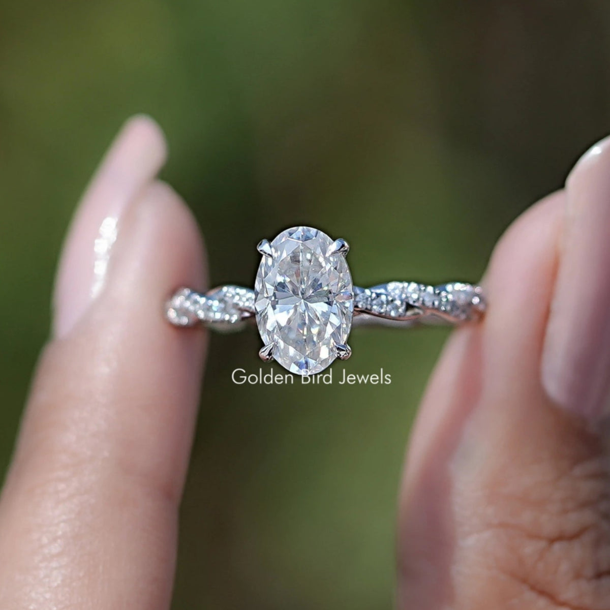 Front view of Oval Shaped Moissanite Twisted Shank Accent Ring