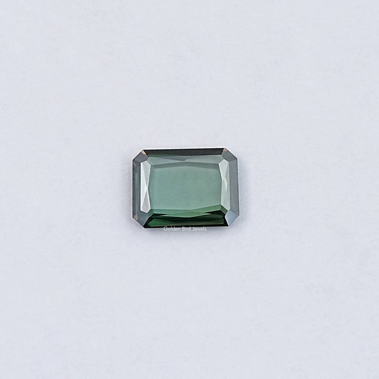 View Of Portrait Cut Emerald Loose Moissanite