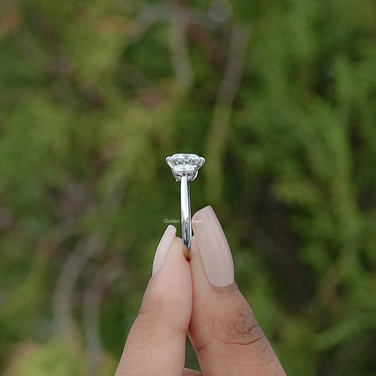 Side View of Old European Round Oval Moissanite Three Stone Ring