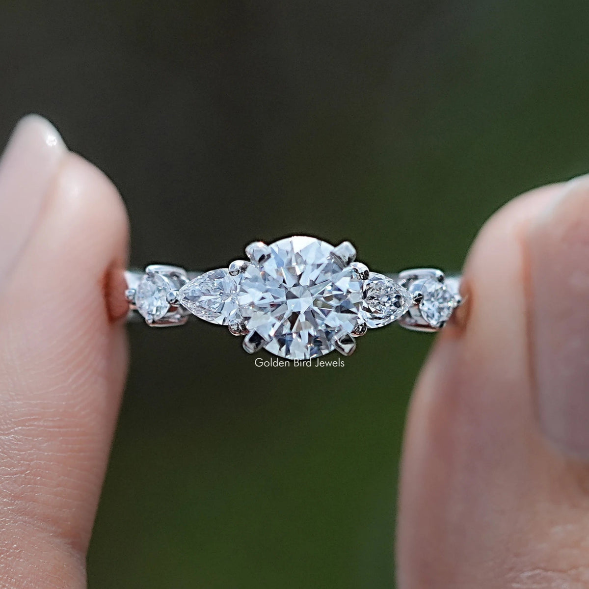 Round And Pear Cut Lab Diamond Five Stone Ring In Two Fingers