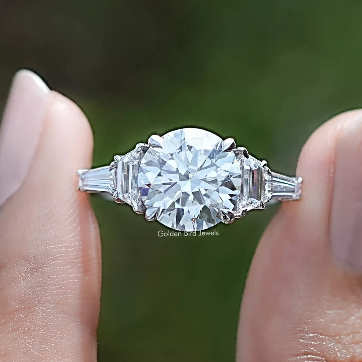Round And Step Cut Trapezoid Lab Diamond Ring In Two Fingers