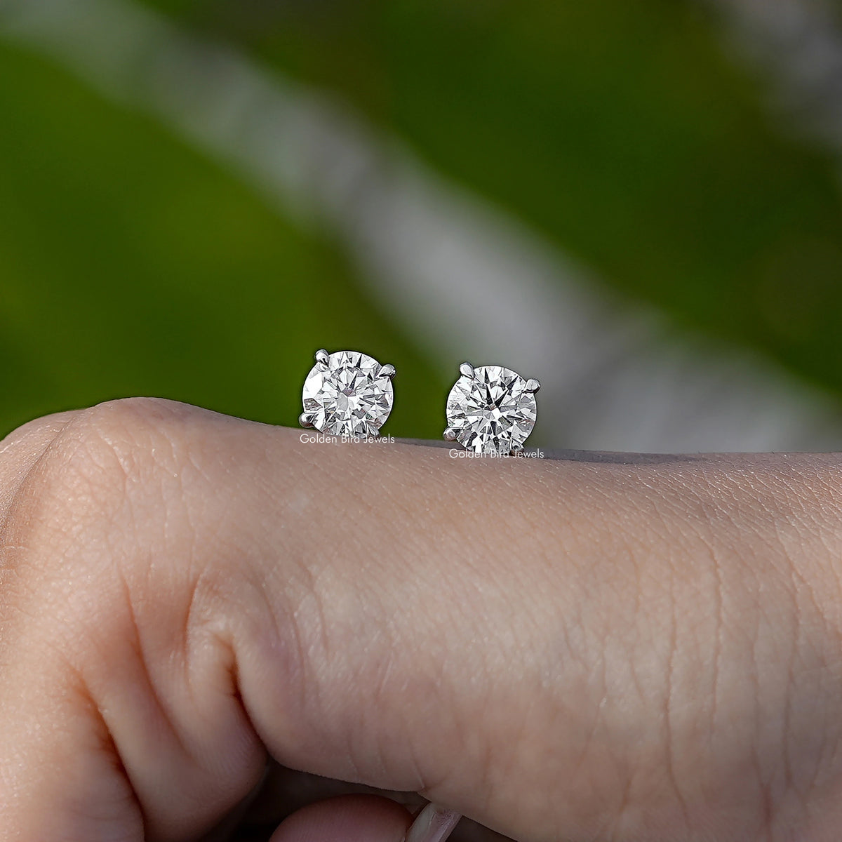 In Hand View Of 2CTW round Cut lab diamond Stud Earring