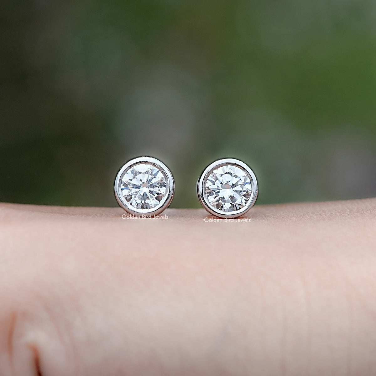 Front view of Round Cut Diamond Bezel Set Stud Earrings