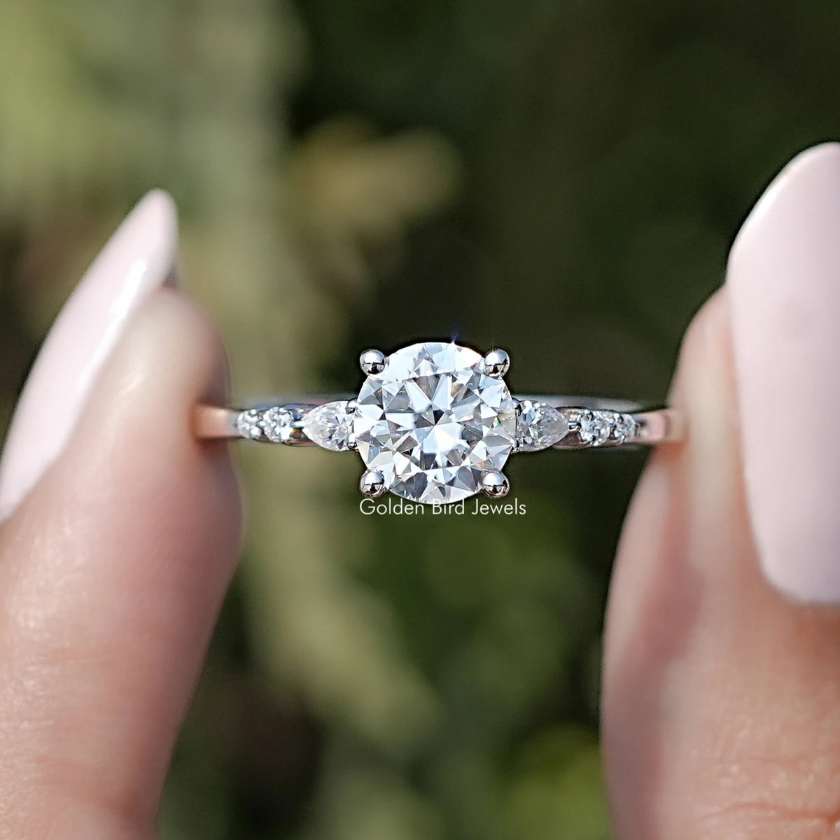 Front view of Round Cut Moissanite Accent Set Engagement Ring