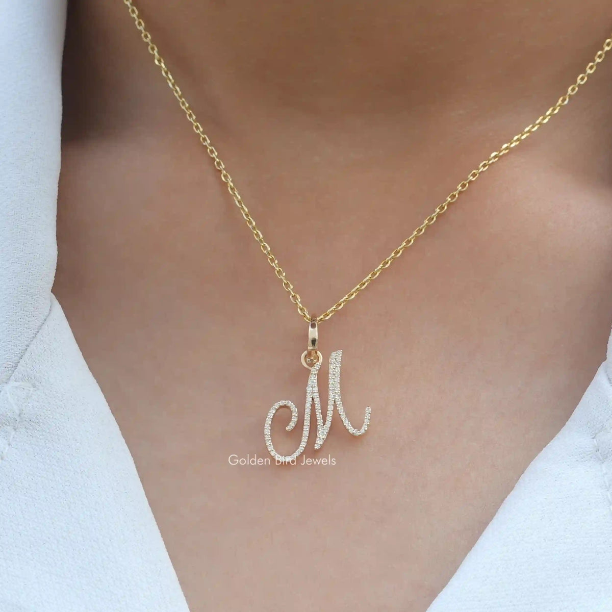 In neck front view of round cut moissanite custom letter pendant