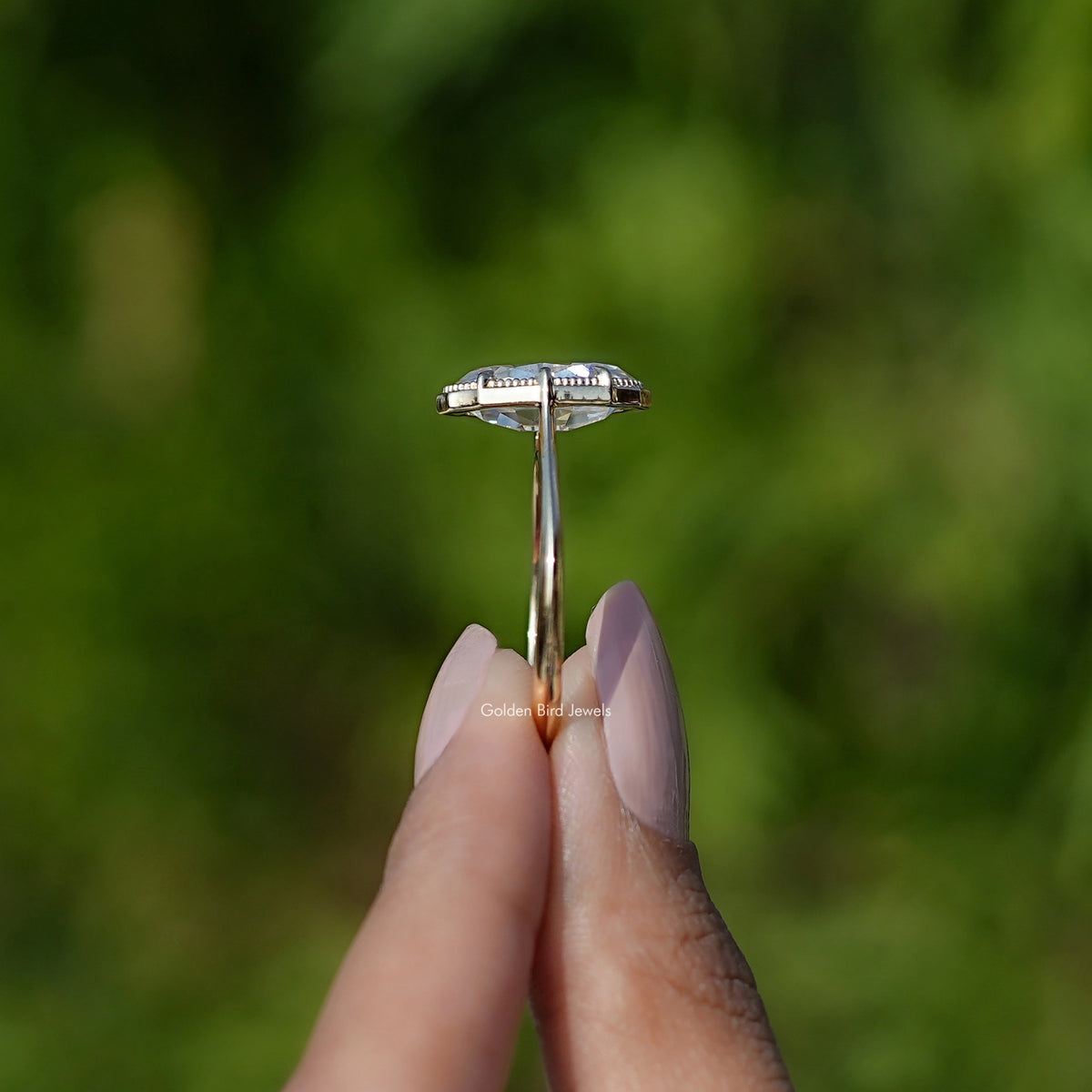Side View of Off-White Old Mine Cut Moval Moissanite Ring