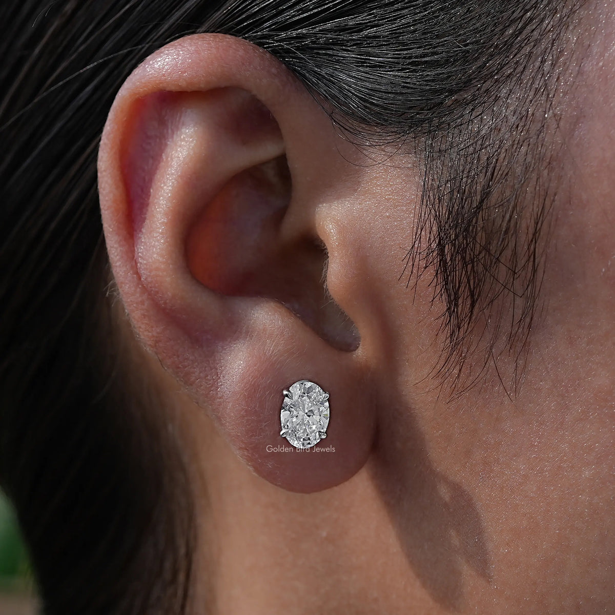 In Ear view of oval Cut lab diamond Stud Earrings