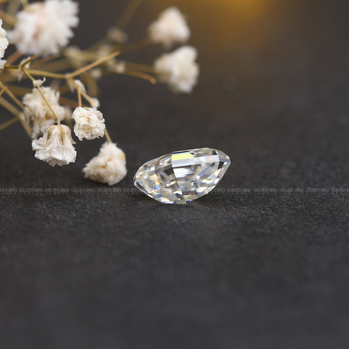 Side View of Step Cut Moval Loose Stone In White Gold