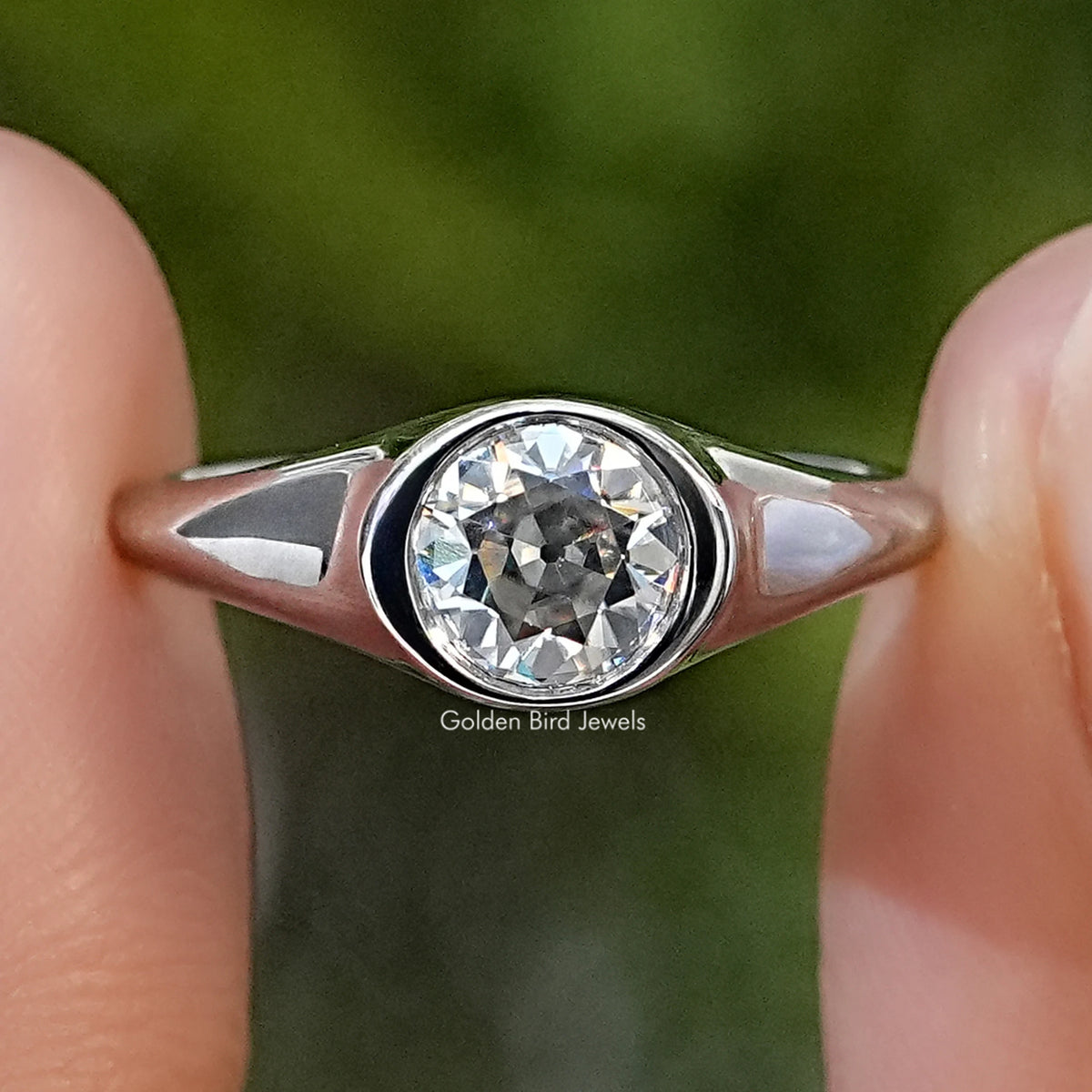 925 sterling silver men's engagement ring with a round moissanite in a bezel setting