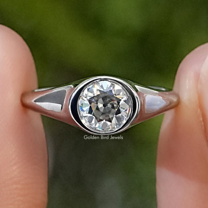 925 sterling silver men's engagement ring with a round moissanite in a bezel setting