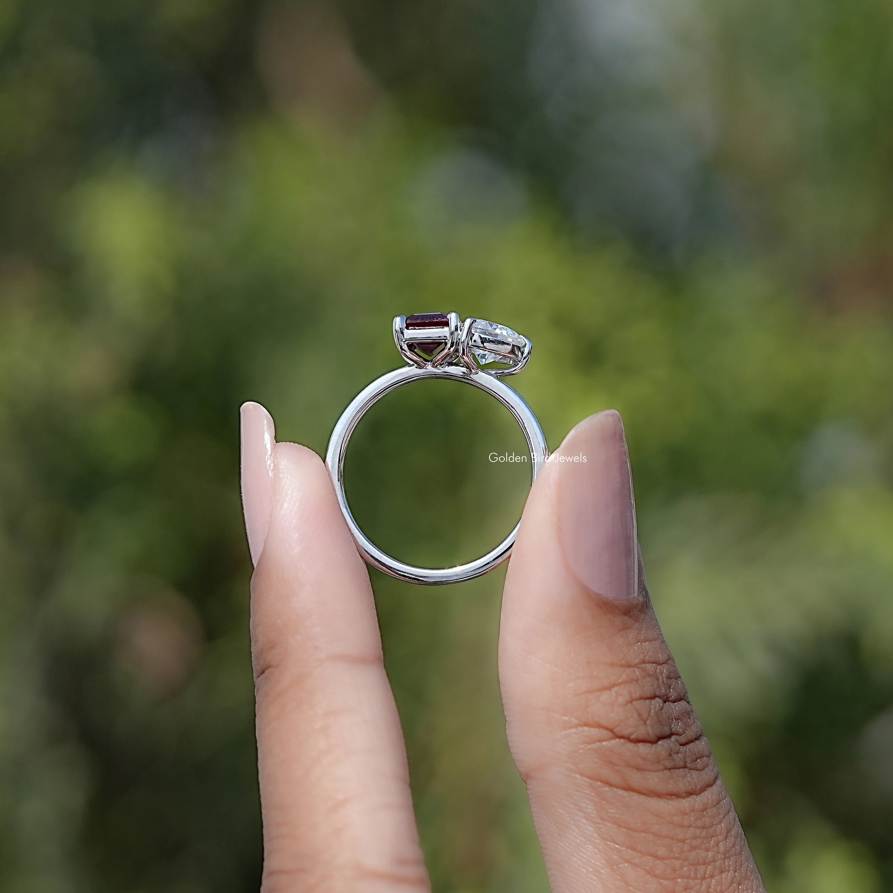 Back view of Heart Cut Moissanite Solitaire Ring in secure setting 