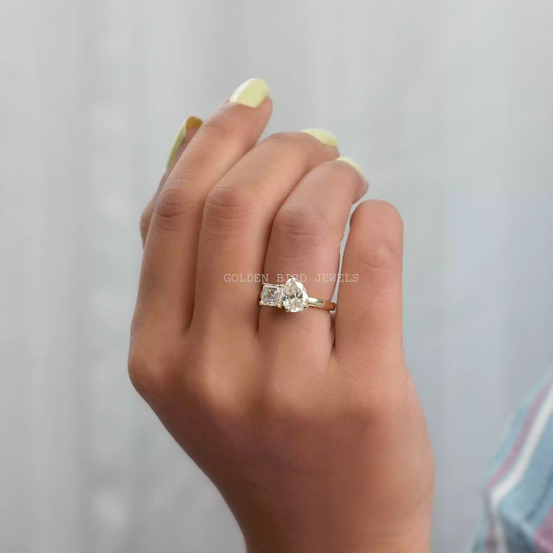 In finger view of multi shape moissanite  ring 